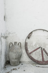 Paleokastritsa Monastery, Corfu, amphora and cartwheel Paleokastritsa Monastery, Corfu, amphora and cartwheel
